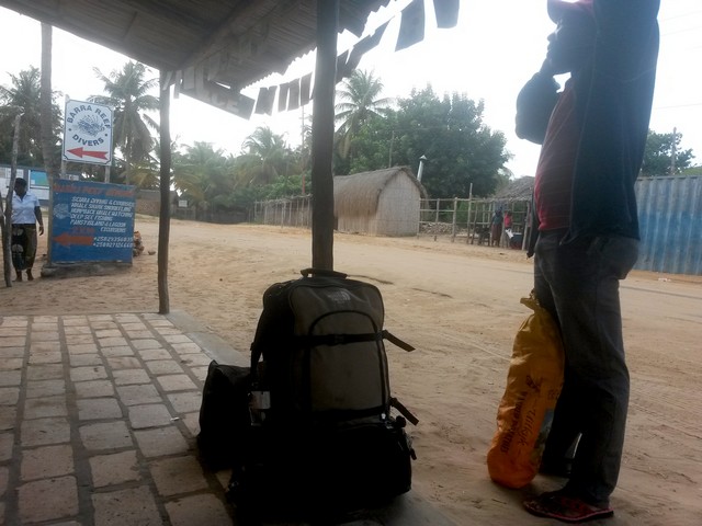 Pedro with a bag of Spuds and my backpack