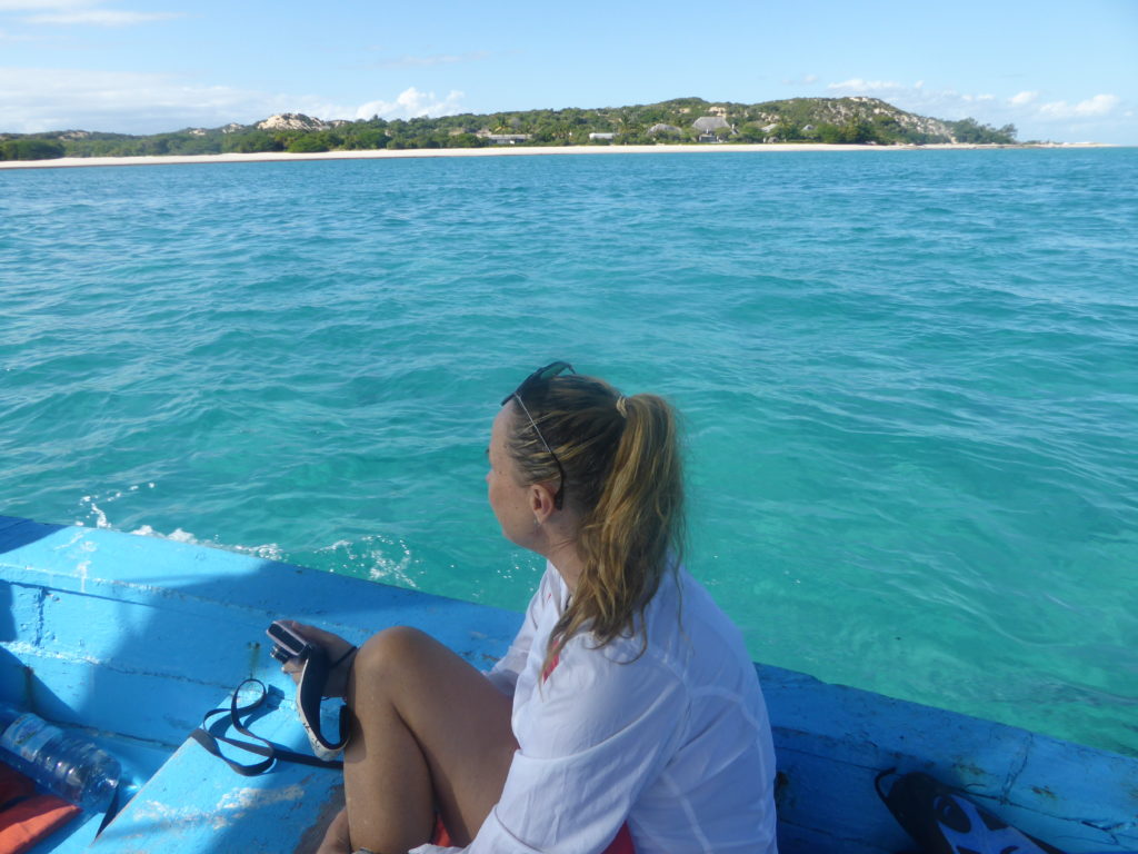 Me sitting on a dhow, Marque island in distance