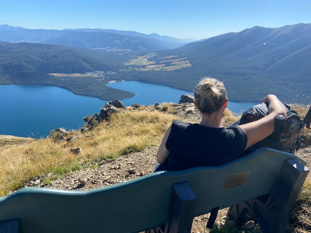 Girl looking over lake